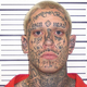 Illustration for article titled Non-White Lady To Marry Dude With White Supremacist Tattoos